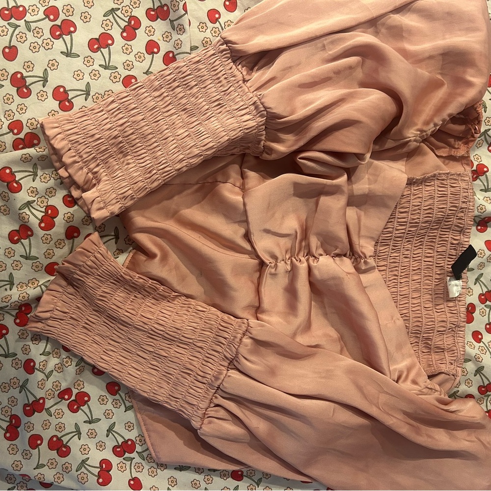 TWO smocked blouses